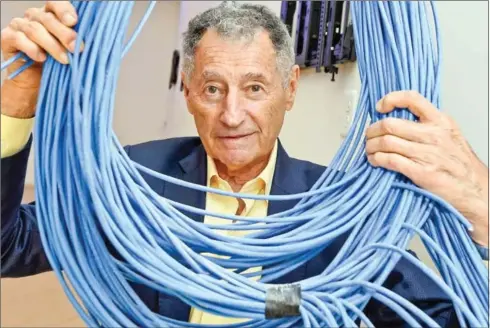  ?? ROBYN BECK/AFP ?? Leonard Kleinrock poses in his new lab at the University of California at Los Angeles (UCLA) on September 24, one month ahead of celebratio­ns to mark the 50th anniversar­y of the creation of the internet.