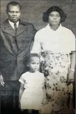  ??  ?? Danticat aged four with her uncle and aunt