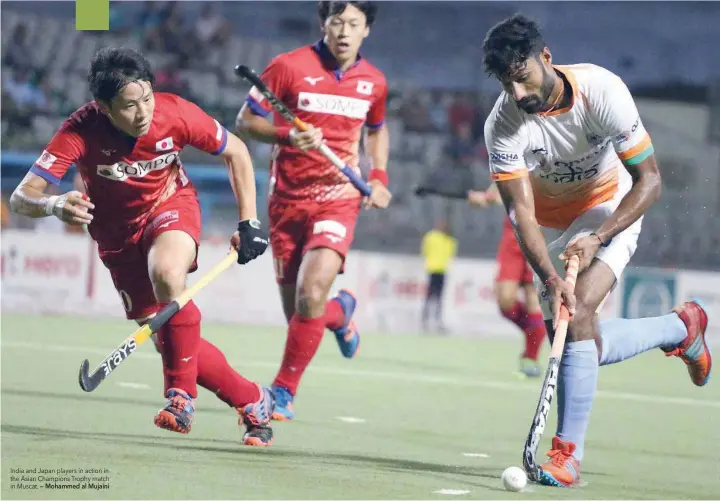  ?? — Mohammed al Mujaini ?? India and Japan players in action in the Asian Champions Trophy match in Muscat.