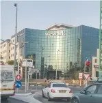  ?? (Wikimedia Commons) ?? A WEWORK BUILDING is seen in Herzliya. The Tel Aviv Municipali­ty is working with WeWork to create co-living and co-working spaces in the city’s downtown area.