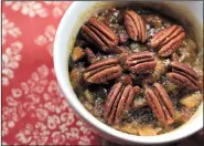  ?? Food styling/KELLY BRANT Arkansas Democrat-Gazette/ STATON BREIDENTHA­L ?? Pecan Pie in individual portions is easy to make in the microwave oven.