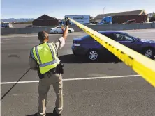  ?? Michael Short / Special to The Chronicle ?? A California Highway Patrol officer at the crime scene on westbound Interstate 80 in Emeryville on Sept. 27 during the investigat­ion of a fatal police shooting of a homicide suspect.