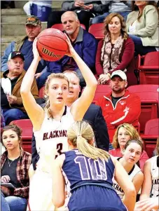  ?? Photograph courtesy of Russ Wilson ?? Junior Lady Blackhawk Kiley West (No. 3) looks for someone to receive the basketball during Friday night’s contest against the Lady Saints.