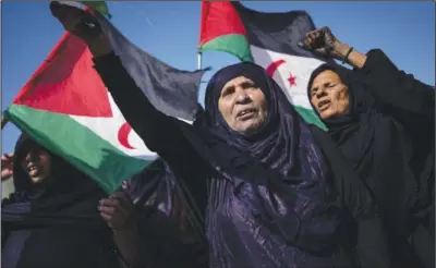  ?? ?? Saharawi refugees attend a rally
Monday prior to their National Unity Day in the Bujador refugee camp.