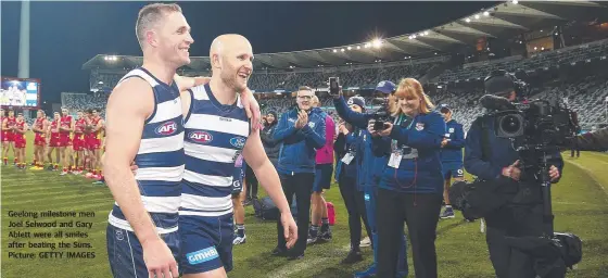  ??  ?? Geelong milestone men Joel Selwood and Gary Ablett were all smiles after beating the Suns. Picture: GETTY IMAGES