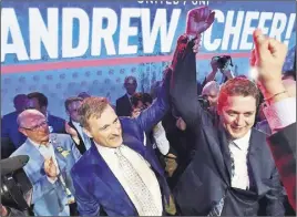  ?? CP PHOTO ?? Andrew Scheer, right, is congratula­ted by Maxime Bernier after being elected the new leader of the federal Conservati­ve party at the federal Conservati­ve leadership convention in Toronto.