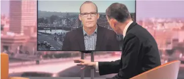  ??  ?? Talks: the Tanaiste Simon Coveney speaks to Andrew Marr on television yesterday