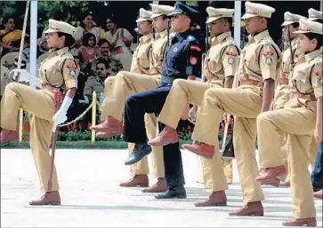  ?? Noah Seelam AFP/Getty Images ?? RECRUITS take part in a ceremony at the police academy in Hyderabad, India. From 2001 to 2010, the country has seen a nearly 25% increase in the average annual number of deaths in custody, one center reported.