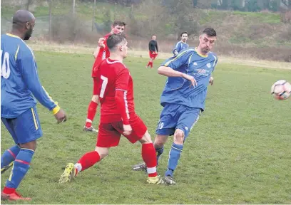  ??  ?? ●●Action from Heaton Mersey’s game against Manchester Polonia (in red)