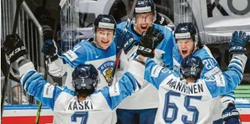  ?? Foto: Imago/ITAR-TASS ?? Riesige Freude herrschte beim Team Finnland, das Kanada im WM-Finale mit 3:1 besiegte.