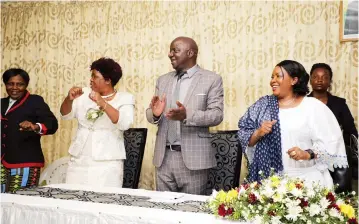  ?? Picture: John Manzongo ?? First Lady Auxillia Mnangagwa (right) joins Zimbabwe National Liberation W ar Veterans secretary in the Politburo Cde Douglas Mahiya, Senators Alice Dube (second from left) and Molly Ndlovu in song and dance during an interface with female former freedom fighters in Bulawayo on Thursday.—