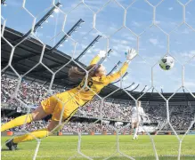  ?? TIM NWACHUKWU/ ?? Cassie Miller is unable to save a shot by Kelley O’Hara of the Washington Spirit during extra time, which proved to be the game-winning goal on Saturday.
GETTY