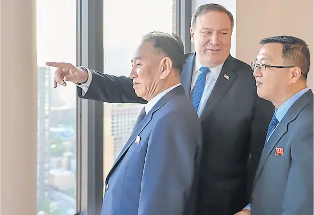  ?? AFP PHOTO / US DEPARTMENT OF STATE ?? Kim Yong-chol, left, Vice Chairman of North Korea, meets US Secretary of State Mike Pompeo, centre, on Wednesday in New York for talks on salvaging a Trump-Kim summit meeting.