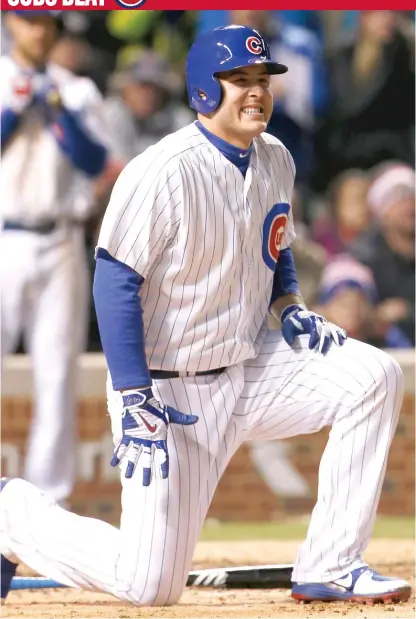  ?? | AP ?? The Cubs’ Anthony Rizzo grimaces after being hit on the forearm by a fastball from Yankees closer Aroldis Chapman on May 7.