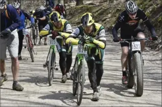  ?? JOHN RENNISON, THE HAMILTON SPECTATOR ?? Another record field will tackle the Paris to Ancaster bike race Sunday, and its infamous fine line hill.