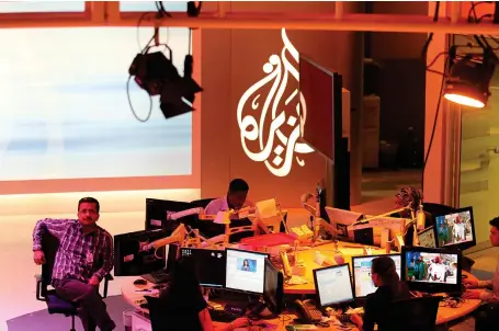  ?? Wolfgang Kumm / EPA ?? A studio in the Al Jazeera Arabic station in Doha, which four Arab countries say must close