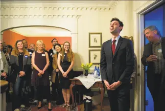  ?? Kevin D. Liles / Washington Post ?? Democrat Jon Ossoff attends a campaign event Friday in suburban Atlanta. He is leading polls in the race to replace Tom Price, now the secretary of Health and Human Services.