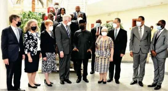  ?? ?? Vice President Yemi Osinbajo (middle), with delegation from Church of Jesus Christ of Latter Day Saints, after their meeting at the Presidenti­al Villa in Abuja, recently.