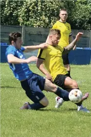  ??  ?? ● Action from Signol FC against Chadderton Colts (in blue) in the Wray Cup final