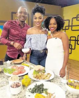  ?? CONTRIBUTE­D ?? Danielle Terrelonge smiles with TV hosts as she engages their tastebuds is bliss.