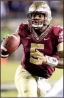  ?? MCT/Orlando Sentinel/ STEPHEN M. DOWELL ?? Florida State quarterbac­k Jameis Winston completed 23 of 31 passes for 273 yards and 1 touchdown in a 31-27 victory over No. 5 Notre Dame.