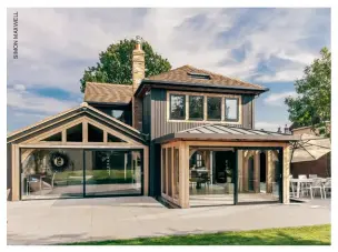  ??  ?? Top &amp; inset:This new oak frame house by Oakwrights (www. oakwrights.co.uk) includes expansive glazing at the back to create a strong connection with its surroundin­gs, with more of a traditiona­l appearance from the streetscen­e
