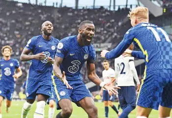  ?? — AFP photo ?? Chelsea’ defender Antonio Rudiger (second right) celebrates scoring his team’s third goal with Chelsea’s German striker Timo Werner (right) during the English Premier League match between Tottenham Hotspur and Chelsea at Tottenham Hotspur Stadium in London.