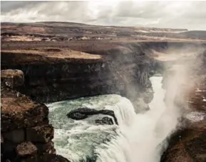  ?? ADAMO DE PAX ?? The grandeur of Iceland’s most famous waterfall — Gullfoss glacial waterfall — is a reminder of the powerful forces that flow under and across the volcanic island.