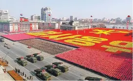  ?? AFP ?? Corea del Norte realizó un desfile militar a un día de arrancar la justa.