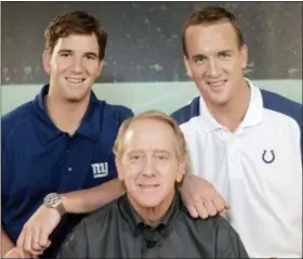  ?? REED SAXON — THE ASSOCIATED PRESS FILE ?? In this file photo, Archie Manning, center, is joined by sons Eli Manning, left, and Peyton Manning in Beverly Hills When Archie’s sons, first Peyton in 1998 and then Eli in 2004, broke into the NFL, all he had to do was sit in his favorite chair and turn on DirecTV’s Sunday Ticket.