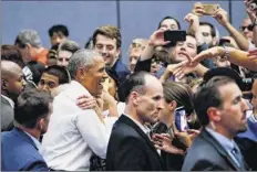  ?? Ringo H.W. Chiu / Associated Press ?? Former President Barack Obama greets supporters as he campaigns in support of California congressio­nal candidates.