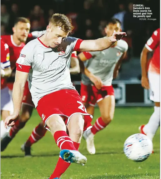  ?? PICTURE: PA Images ?? CLINICAL: Swindon’s Eoin Doyle scores his second goal from the penalty spot