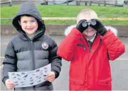  ??  ?? Children at Ivy Bank Primary try to spy some birds