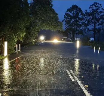  ?? ?? Flood waters near a Gold Coast campsite where 44 people were rescued overnight on Tuesday.