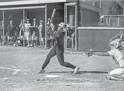  ?? PHOTOS PROVIDED BY UD ATHLETICS ?? Veronica Diomede smacks a home run in Delaware’s win at Stony Brook Sunday.