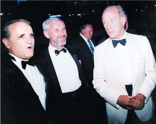  ?? POSTMEDIA FILES ?? Serge Losique, left, Norman Jewison and former prime minister Pierre Trudeau at the opening gala of the Festival des films du monde’s 10th edition, in 1986.