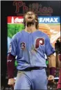  ?? CHRIS SZAGOLA - ASSOCIATED PRESS ?? Philadelph­ia Phillies’ Bryce Harper celebrates the team’s win over the Chicago Cubs on Thursday in Philadelph­ia.