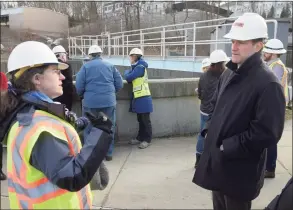  ?? H John Voorhees III / Hearst Connecticu­t Media ?? U.S. Rep. Jim Himes, right, talks with Water Pollution Control Authority Chair Amy Siebert during a tour of the Ridgefield wastewater improvemen­t project on Thursday afternoon. The project is partially funded by $2.9 million of the town’s American Rescue Plan funds.
