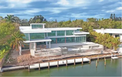  ?? PHOTOS PROVIDED BY CMS ?? A Siesta Key property owned by the former president of Playboy Entertainm­ent has been listed for sale for $19.95 million. The owner, Randy Nicolau, bought the property in 2018 for $2.5 million.