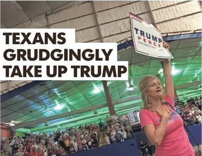  ?? PHOTOS BY RICK JERVIS, USA TODAY ?? Elisabeth Carr, 50, shows her support during a Donald Trump rally in Austin on Tuesday evening.