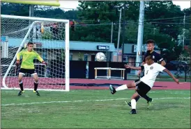  ?? File-LARRY GREESON / For the Calhoun Times ?? Calhoun’s Daniel Isep (11) takes a shot on goal during the second half of Wednesday’s game.