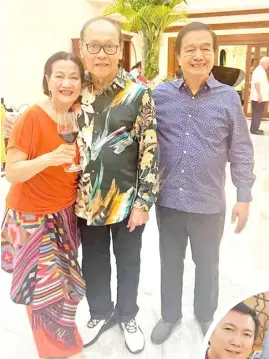  ?? ?? BIRTHDAY celebrator Boboy Atillo with sister-in-law Lillian and her husband Dodong Robillo.