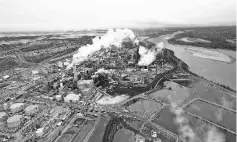  ??  ?? The Suncor tar sands processing plant near the Athabasca River at their mining operations near Fort McMurray.