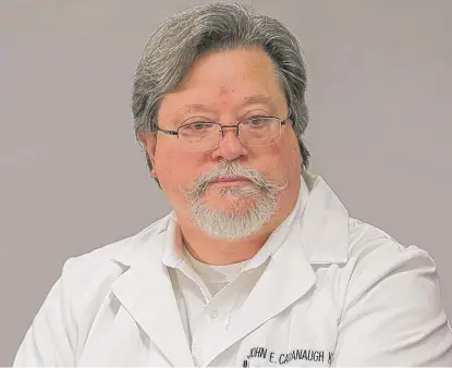  ?? SUN-TIMES FILE ?? Dr. John E. Cavanaugh is now under scrutiny by his boss at the coroner’s office in Indianapol­is after the Sun-Times reported the former top Cook County medical examiner’s deputy was fired after a review found he botched autopsies.