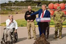  ?? Eric Gay/associated Press ?? GOP candidate and former President Donald Trump points to Gov. Greg Abbott as he speaks at Shelby Park on Thursday in Eagle Pass. Trump said Abbott is on his list for vice president.