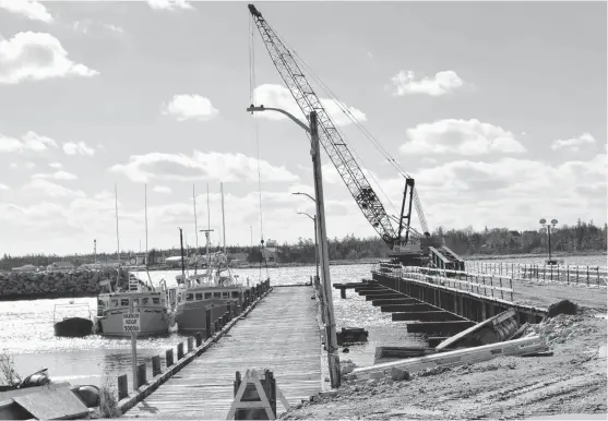  ?? KATHY JOHNSON PHOTOS ?? The constructi­on of a new wharf at Seal Point in Upper Port LaTour is well underway. The $6.8 million project includes the constructi­on of a new crib wharf to the west of the currently load restricted wooden wharf.