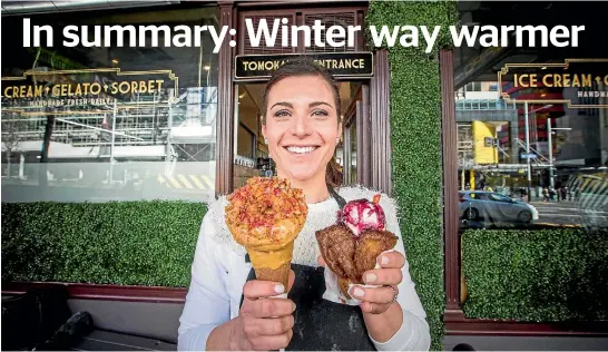  ?? JASON DORDAY / FAIRFAX NZ ?? Annarosa Grazioli shows off some of Giapo’s ice cream flavours at the Auckland parlour yesterday.