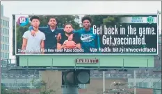  ?? Richard Dow / Barrett Outdoor Communicat­ions ?? From left, Adam Elkharraz, Derrell Redd, Fredo Delgado and Christian McClease appear on a digital billboard in New Haven to promote getting the COVID-19 vaccine.