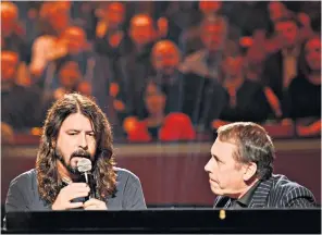  ??  ?? Rocking, popping, rapping and swinging on: Jools Holland talks with Foo Fighter Dave Grohl