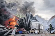  ?? ?? Kyiv Tackling a blaze in a warehouse that was hit by Russian shelling